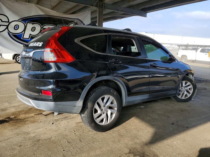 Photo 3 from auction – 2016 HONDA CR-V EXL with VIN 2HKRM3H73GH509656