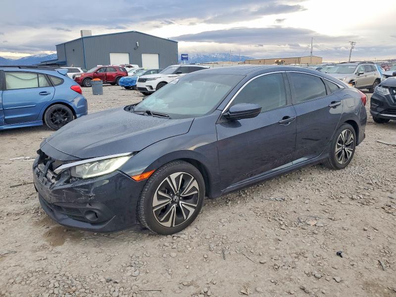 HONDA CIVIC 2016 with VIN 19XFC1F74GE016330 - Photo from auction