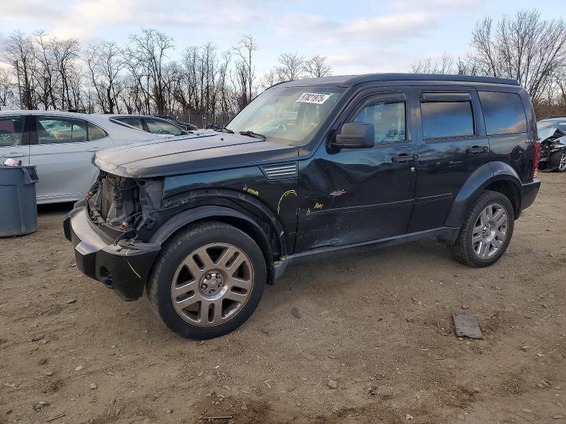 DODGE NITRO 2010 with VIN 1D4PU4GK6AW170981 - Photo from auction