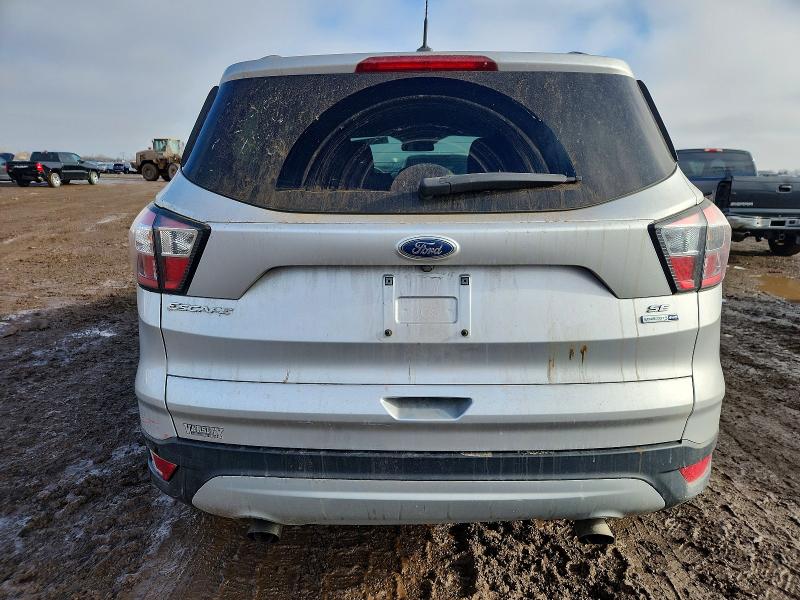 Photo 6 from auction – 2018 FORD ESCAPE with VIN 1FMCU9GD9JUA83366