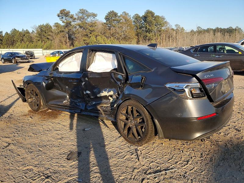 Photo 2 from auction – 2022 HONDA CIVIC SPOR with VIN 2HGFE2F56NH563696