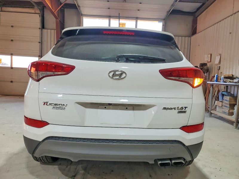 Photo 6 from auction – 2016 HYUNDAI TUCSON LIM with VIN KM8J3CA26GU172481
