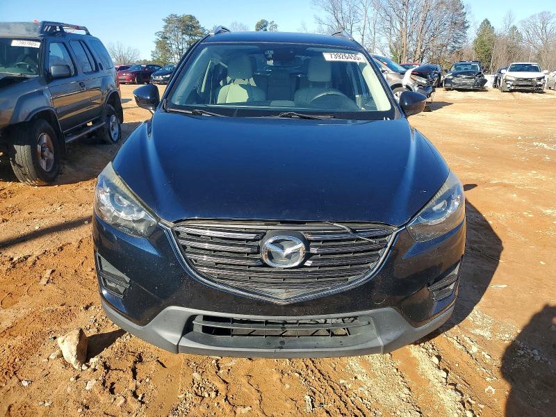 Photo 5 from auction – 2016 MAZDA CX-5 with VIN JM3KE2DY8G0874412