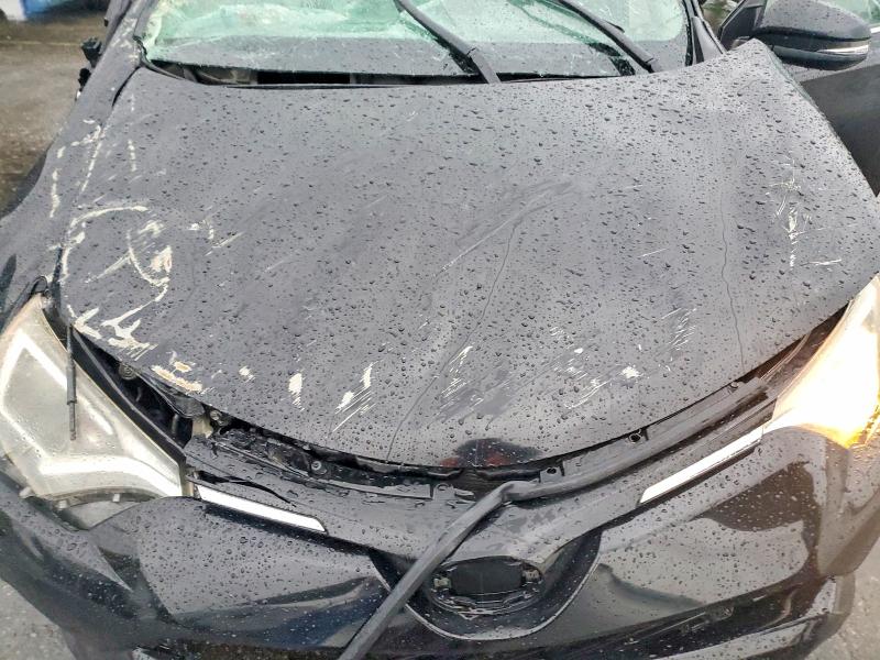 Photo 12 from auction – 2018 TOYOTA RAV4 with VIN 2T3WFREV0JW484668