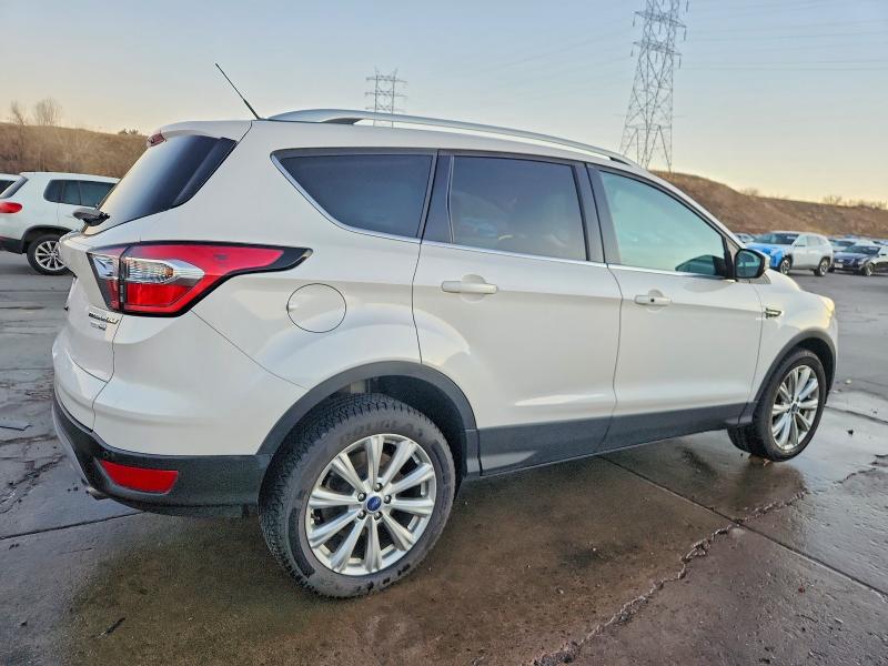 Photo 3 from auction – 2017 FORD ESCAPE TIT with VIN 1FMCU9J93HUE95765