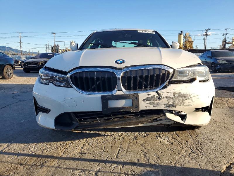Photo 5 from auction – 2022 BMW 330I with VIN 3MW5R1J09N8C41999