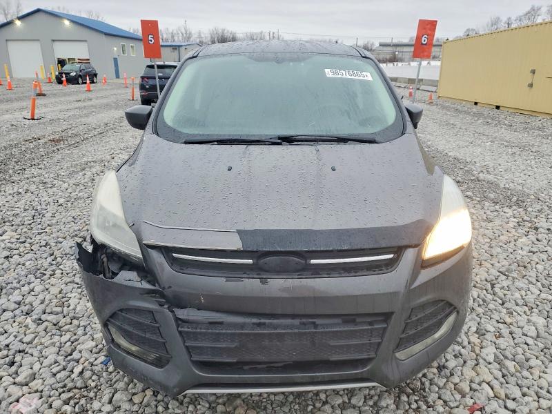 Photo 5 from auction – 2015 FORD ESCAPE SE with VIN 1FMCU0G76FUC58234