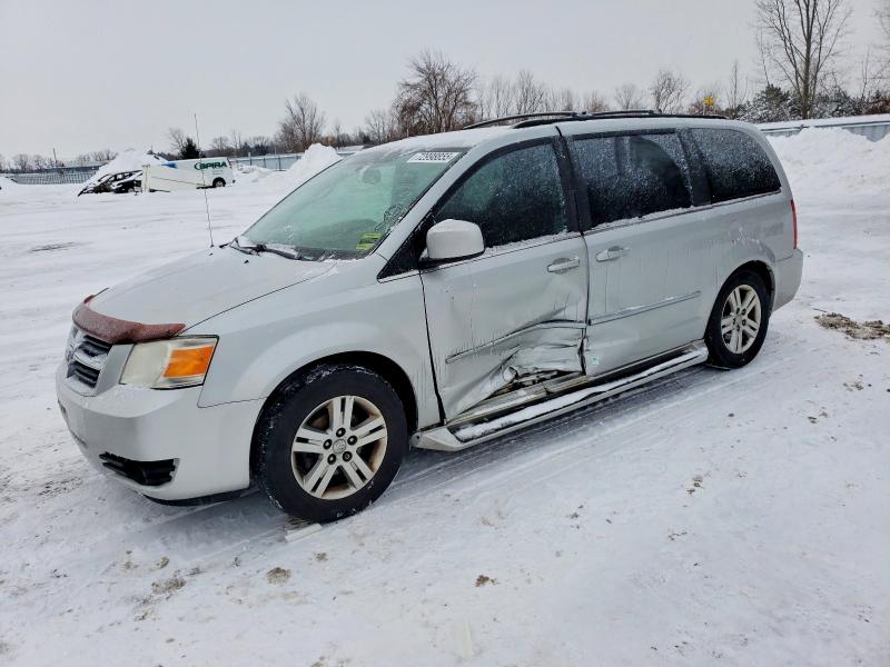 DODGE GRAND CARA 2010 with VIN 2D4RN4DX3AR410213 - Photo from auction