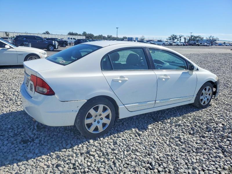 Photo 3 from auction – 2011 HONDA CIVIC LX with VIN 2HGFA1F56BH538685