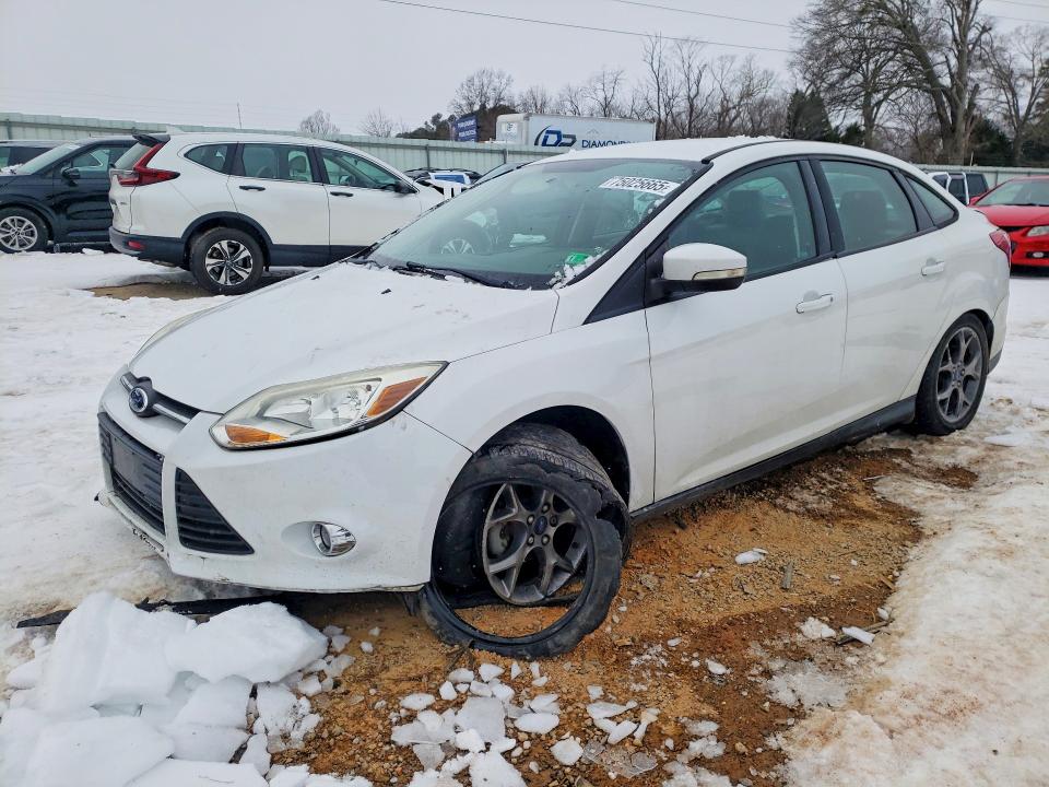 FORD FOCUS 2014 with VIN 1FADP3F23EL414876 - Photo from auction