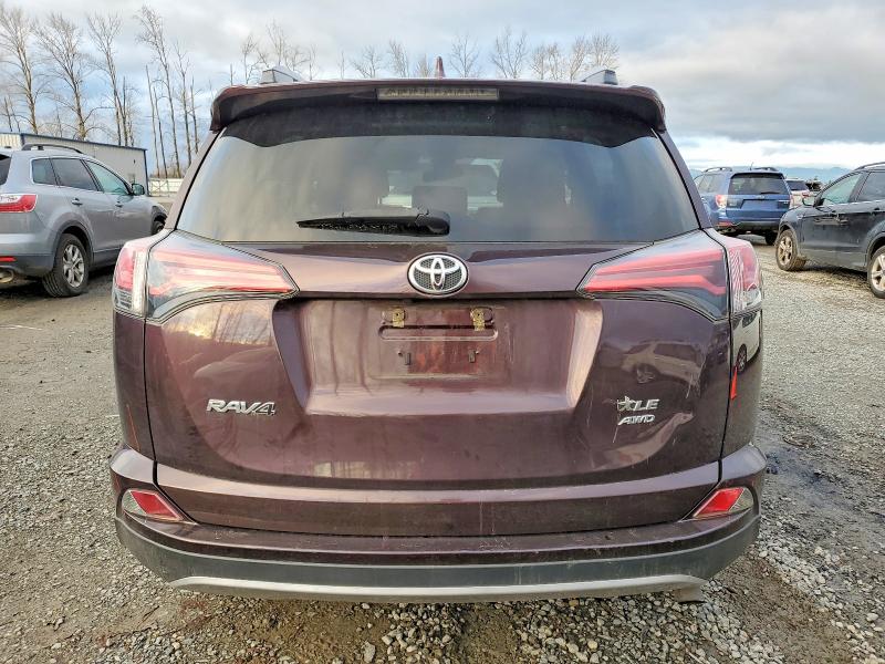 Photo 6 from auction – 2018 TOYOTA RAV4 with VIN 2T3RFREV3JW856842