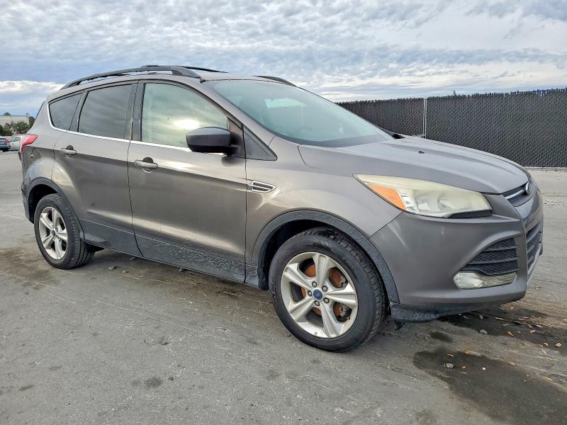 Photo 4 from auction – 2013 FORD ESCAPE with VIN 1FMCU0GX7DUD15456