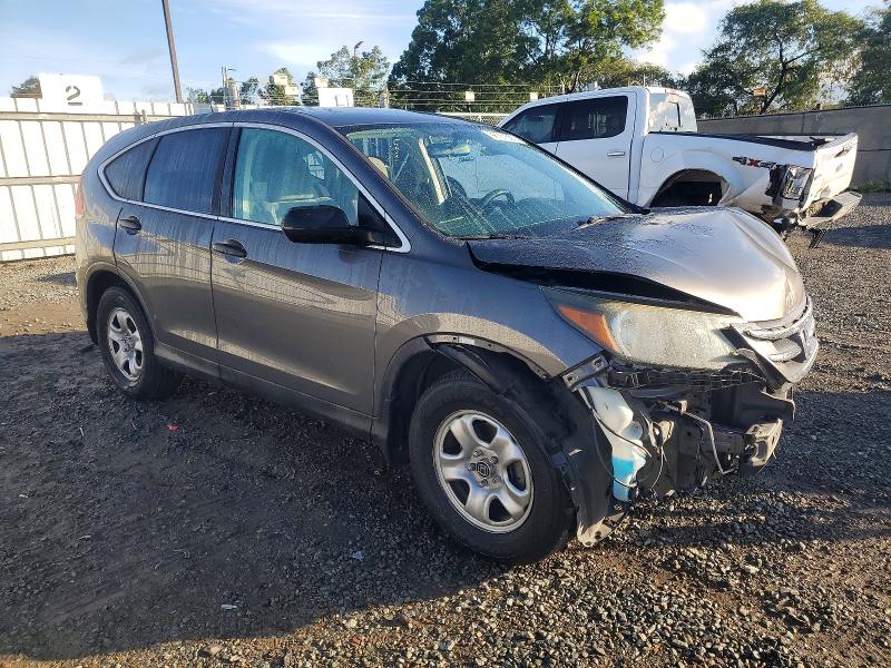 Photo 4 from auction – 2014 HONDA CR-V with VIN 2HKRM3H39EH525094