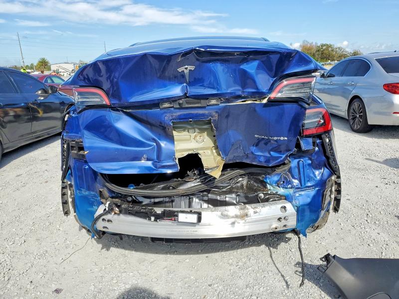 Photo 6 from auction – 2022 TESLA MODEL Y with VIN 7SAYGDEE7NF330479