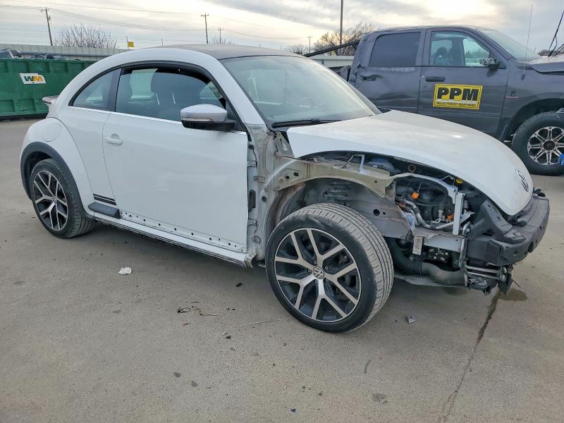 Photo 4 from auction – 2016 VOLKSWAGEN BEETLE DUN with VIN 3VWS17AT8GM634006