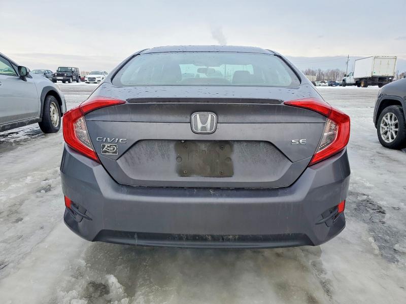 Photo 6 from auction – 2018 HONDA CIVIC with VIN 2HGFC2F68JH035327