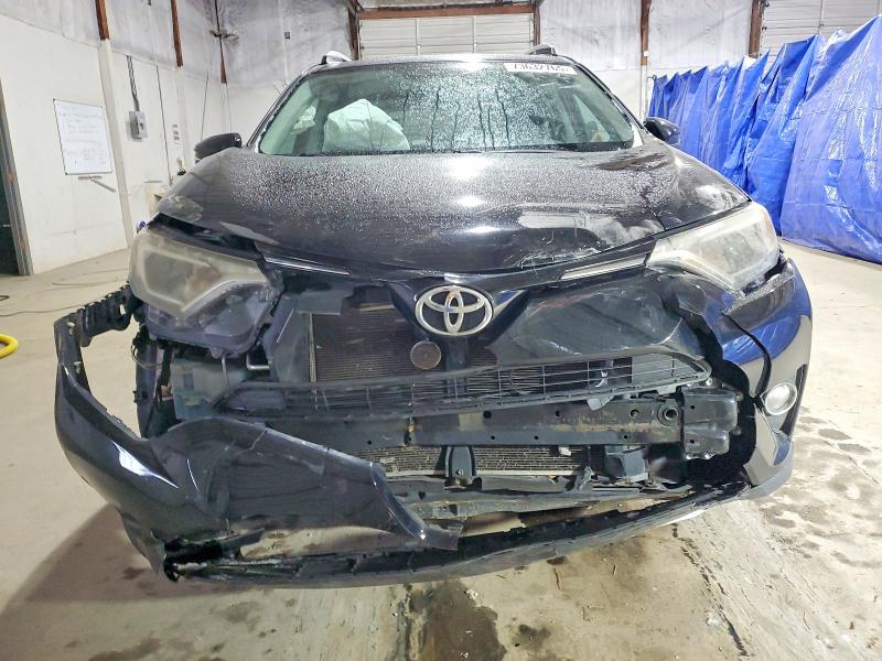 Photo 5 from auction – 2016 TOYOTA RAV4 with VIN 2T3WFREV9GW242874
