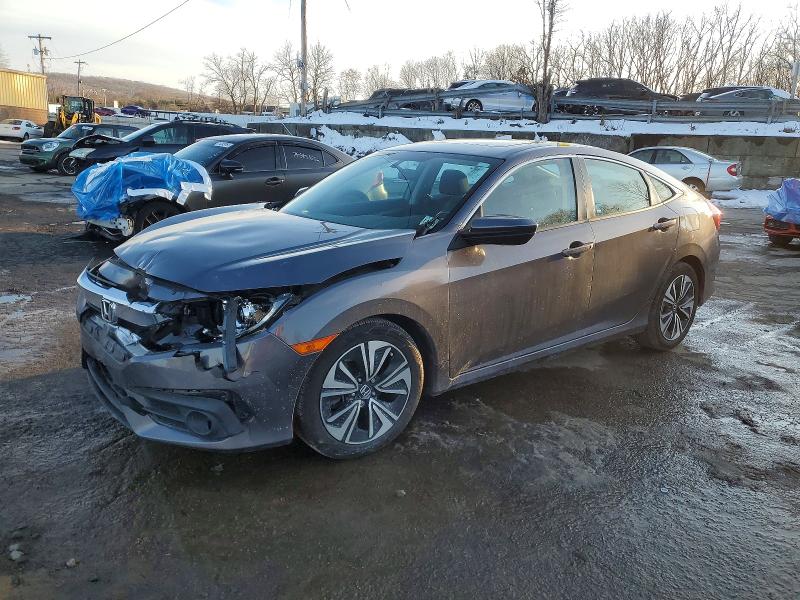 Photo 1 from auction – 2018 HONDA CIVIC EX with VIN 2HGFC1F3XJH641129