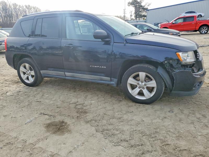 Photo 4 from auction – 2011 JEEP COMPASS with VIN 1J4NT1FA8BD139074