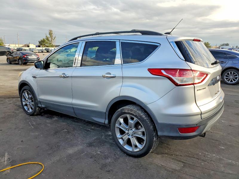 Photo 2 from auction – 2013 FORD ESCAPE with VIN 1FMCU9HX9DUC16947