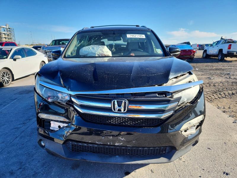 Photo 5 from auction – 2016 HONDA PILOT with VIN 5FNYF6H52GB099808