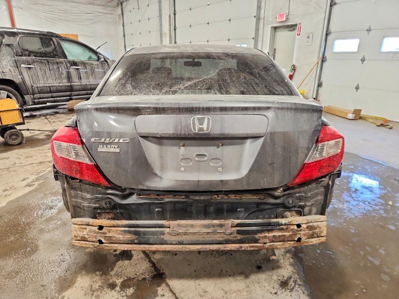 Photo 6 from auction – 2012 HONDA CIVIC LX with VIN 2HGFB2F53CH521153