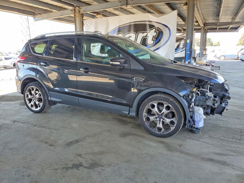 Photo 4 from auction – 2014 FORD ESCAPE TIT with VIN 1FMCU0JX3EUB38088