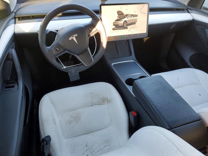 Снимка 8 от търг – 2023 TESLA MODEL Y с VIN 7SAYGDEE4PF674287