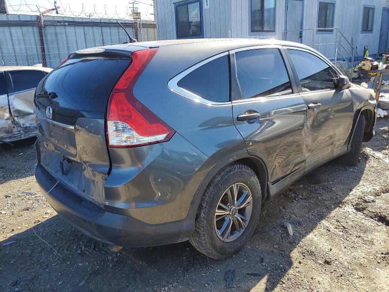 Photo 3 from auction – 2014 HONDA CR-V LX with VIN 3CZRM3H3XEG715604