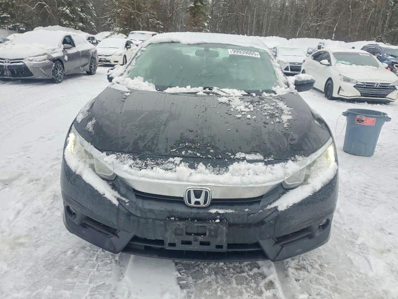 Photo 5 from auction – 2016 HONDA CIVIC LX with VIN 2HGFC2F55GH017982