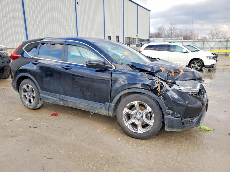 Photo 4 from auction – 2017 HONDA CR-V with VIN 2HKRW1H53HH504276