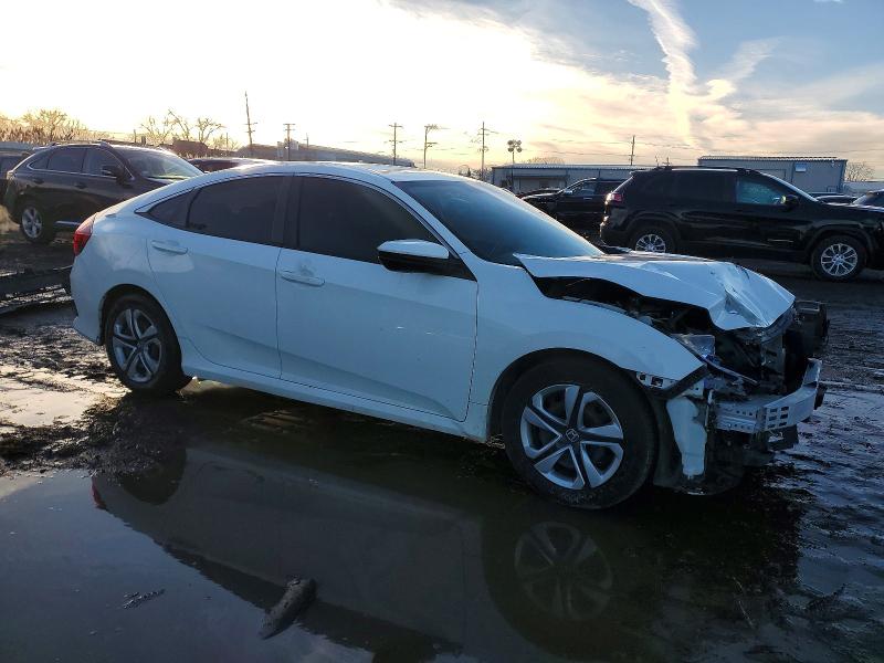 Photo 4 from auction – 2018 HONDA CIVIC LX with VIN 19XFC2F56JE039250