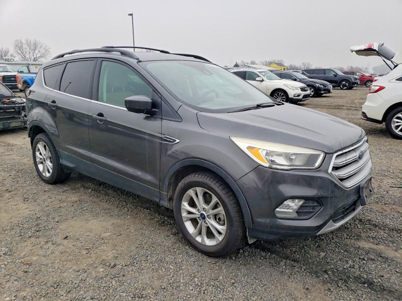 Photo 4 from auction – 2018 FORD ESCAPE SE with VIN 1FMCU9GD2JUA87341