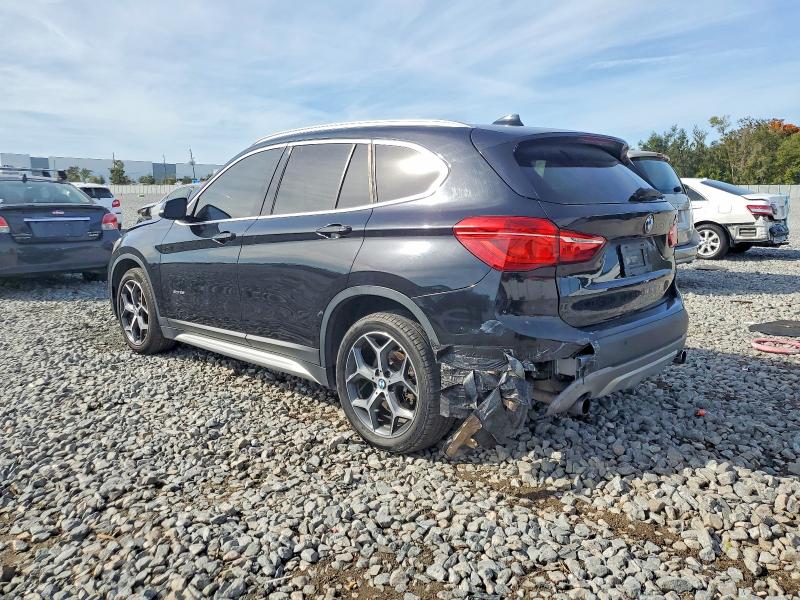 Photo 2 from auction – 2016 BMW X1 XDRIVE2 with VIN WBXHT3C31GP884584
