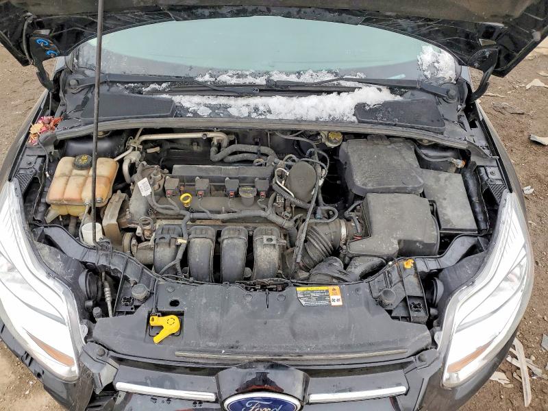Photo 11 from auction – 2014 FORD FOCUS with VIN 1FADP3F26EL107427