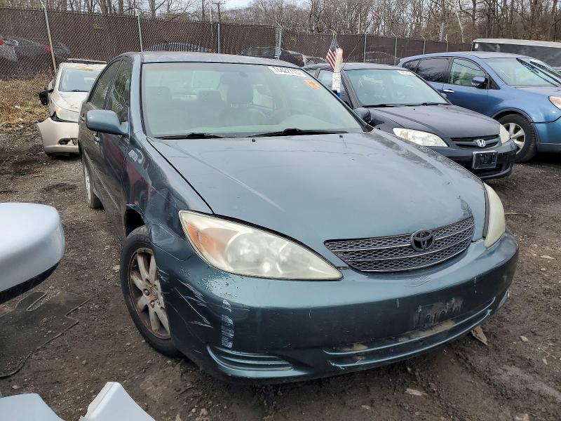 Photo 4 from auction – 2003 TOYOTA CAMRY LE with VIN 4T1BE30K73U666391