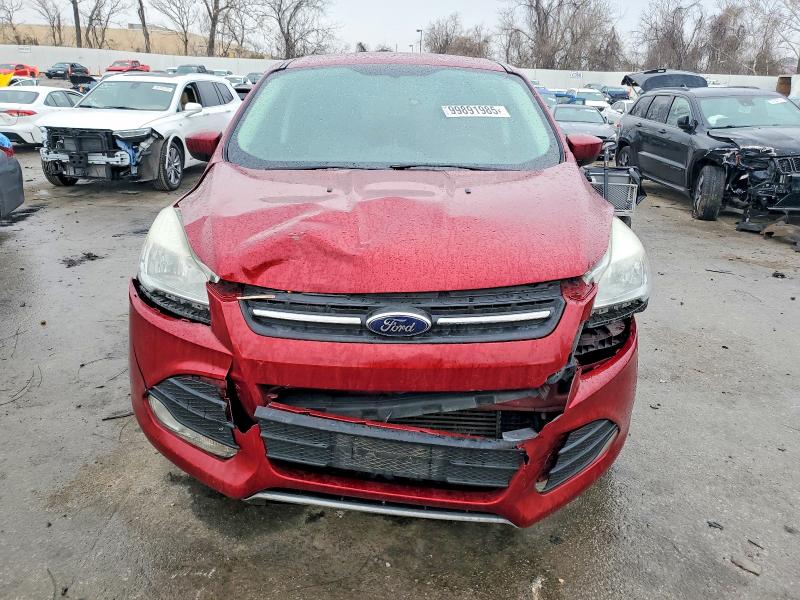 Photo 5 from auction – 2015 FORD ESCAPE with VIN 1FMCU9G95FUA38413