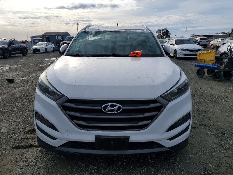 Photo 5 from auction – 2016 HYUNDAI TUCSON LIM with VIN KM8J3CA20GU040218