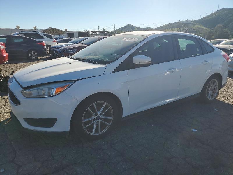FORD FOCUS SE 2015 with VIN 1FADP3F25FL221274 - Photo from auction