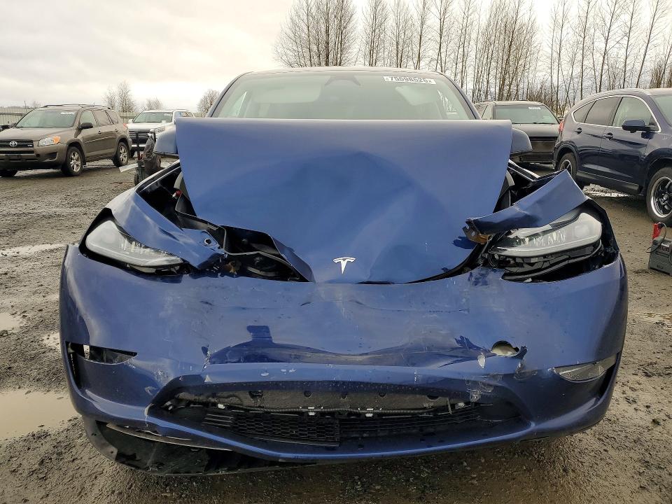 Photo 5 from auction – 2025 TESLA MODEL Y with VIN 7SAYGAEEXSF297083