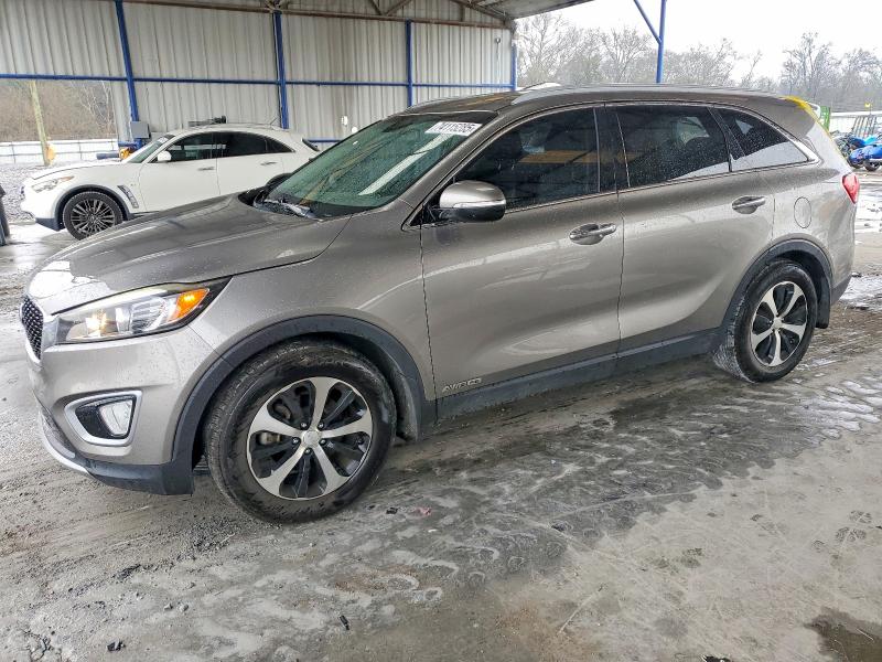 KIA SORENTO EX 2016 with VIN 5XYPHDA52GG018903 - Photo from auction