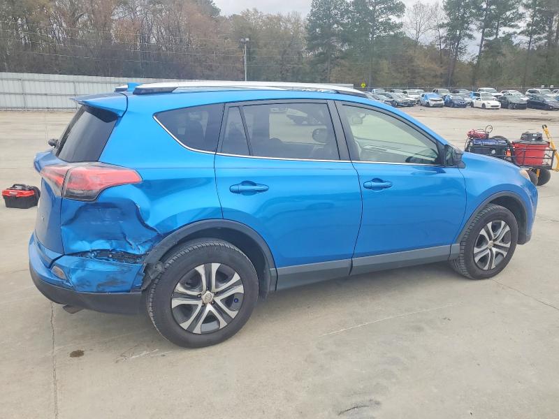 Photo 3 from auction – 2016 TOYOTA RAV4 LE with VIN JTMZFREVXGJ081625