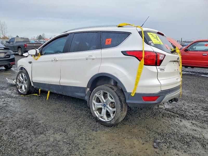 Photo 2 from auction – 2019 FORD ESCAPE TIT with VIN 1FMCU9J94KUA35201