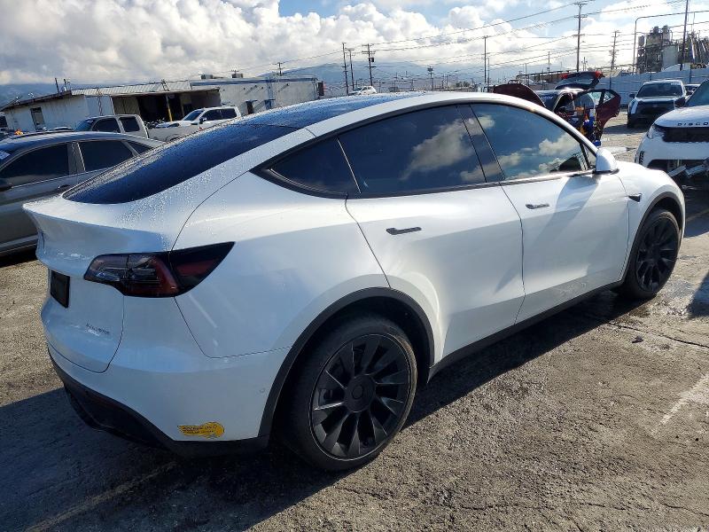 Photo 3 from auction – 2022 TESLA MODEL Y with VIN 7SAYGDEE7NF512246