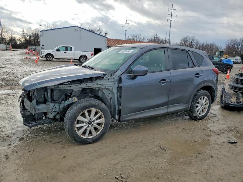 MAZDA CX-5 TOURI 2013 with VIN JM3KE4CE7D0164691 - Photo from auction