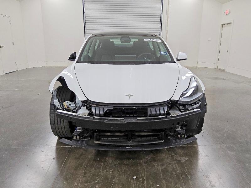 Photo 5 from auction – 2023 TESLA MODEL 3 with VIN 5YJ3E1EA4PF624157