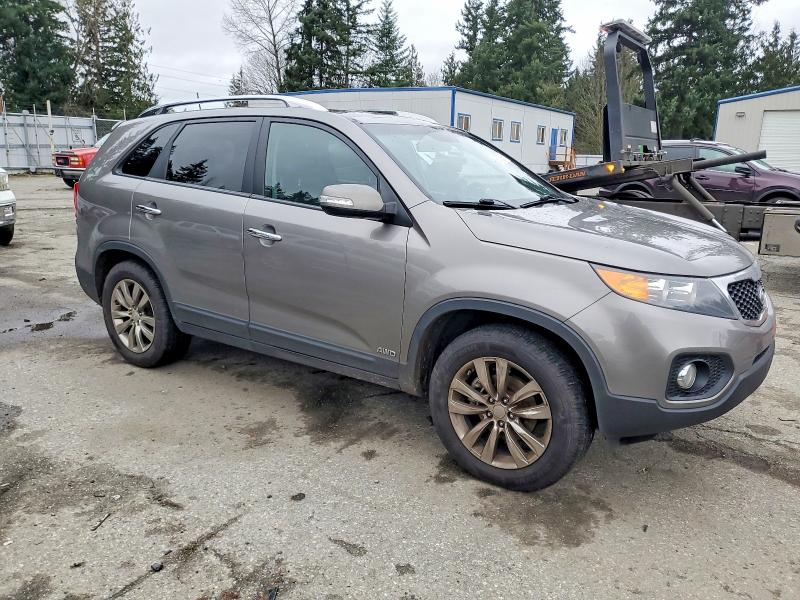 Photo 4 from auction – 2011 KIA SORENTO EX with VIN 5XYKUDA28BG142940