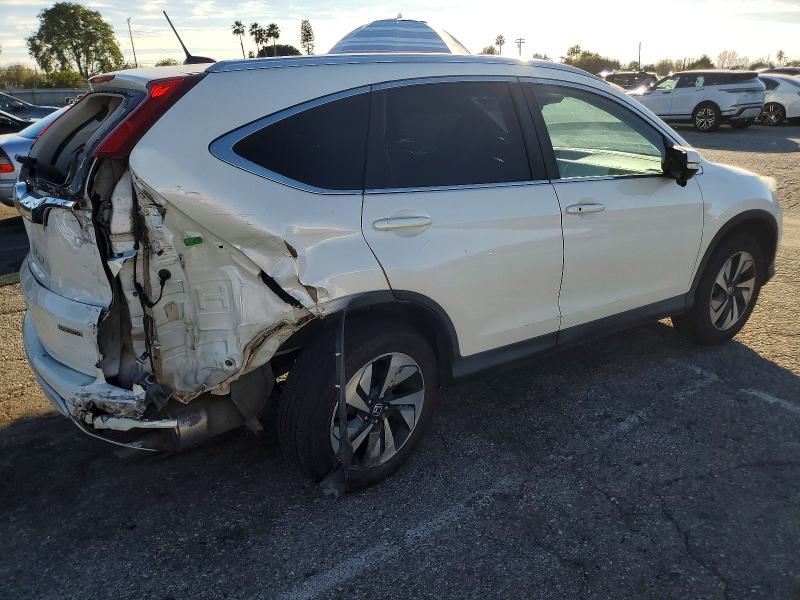 Photo 3 from auction – 2015 HONDA CR-V with VIN 5J6RM3H93FL024665