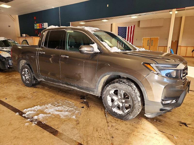 Photo 4 from auction – 2021 HONDA RIDGELINE with VIN 5FPYK3F71MB002440