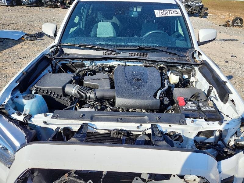 Photo 11 from auction – 2023 TOYOTA TACOMA with VIN 3TMAZ5CN3PM215930